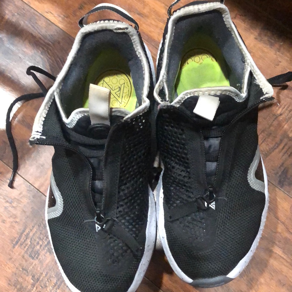 Nike PG-4.  Size 7.5 womens Black and White.